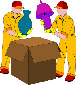 Two man packing things into a box