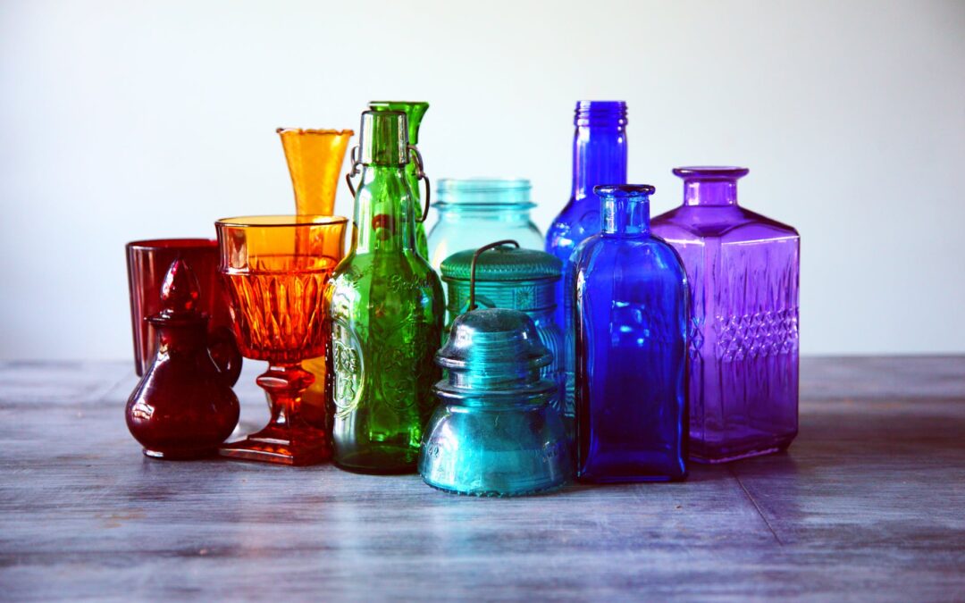 A lot of assorted, glass bottles in many different colors. The bottles look fragile and breakable. It is a known fact that it is not easy to safely pack valuable and fragile items.