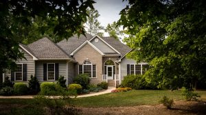Don’t put yourself through the chaos of moving without help. Hire the residential movers in NJ who have years of experience — Moving of America. A house surrounded by tress, which residential movers NJ can relocate.