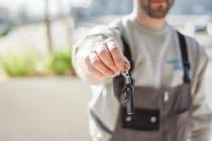We can pack and unpack all of your belongings! man with a key in hand