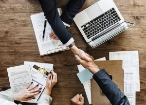 Reliability is one of our greatest qualities. Two people shaking hands upon reaching an agreement with movers East Rutherford NJ.