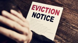 As soon as you see that eviction notice on the table – it’s time to call Moving of America. Eviction Notice on table.