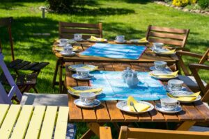 A table set for a outdoor dining and BBQ is a great way to celebrate a short-distance relocation.