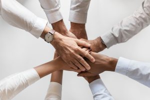 Experience is the common denominator in our company. movers Garfield NJ holding hands