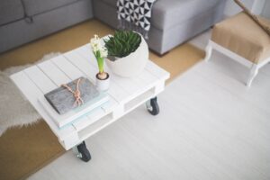 A white, clutter-free coffee table. 