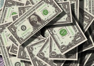 Don’t worry too much about our prices – they won’t break the bank. Dollar bills.