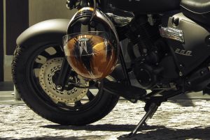 Inflate each tire properly. A black motorcycle.