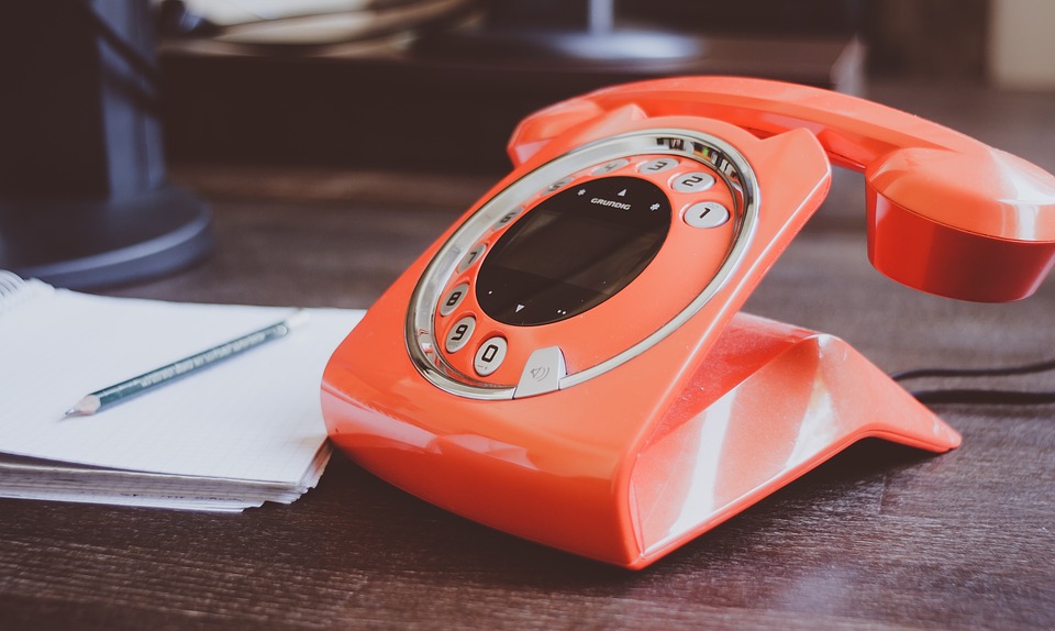 An orange phone to inform that you're moving.