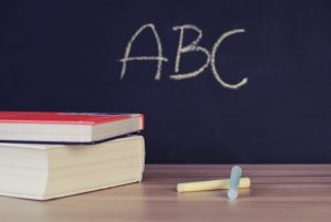 Don’t rush with making this decision and try to visit the schools before you decide. blackboard and some chalk