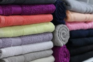 Maintaining order is easier if things are packed neatly stacked towels