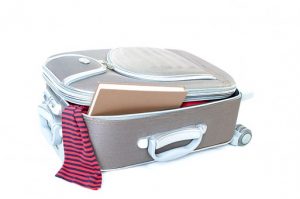 Pack the essentials bag a suitcase