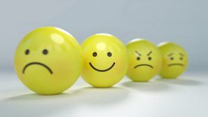 If you feel overwhelmed, it is completely okay to hire someone to help you with decluttering! smiley faces that represent your emotions while decluttering your estate