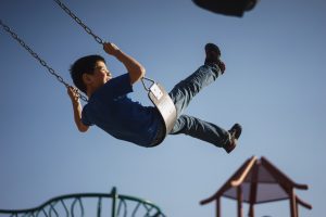 A kid on a swing