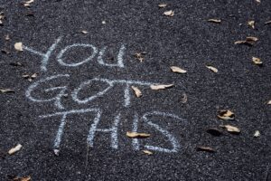 "You got this" written in chalk on concrete.