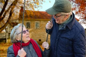 You need to choose a retirement location that will make you happy old couple tlaking about how to choose a good retirement location