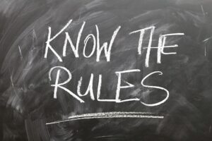 "know the rules" written on a blackboard